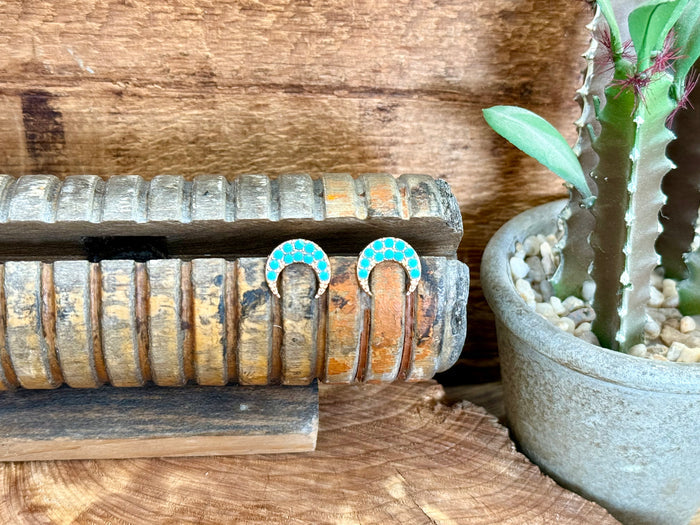 Gold-tone turquoise crescent stud earrings with turquoise beaded halo detail
