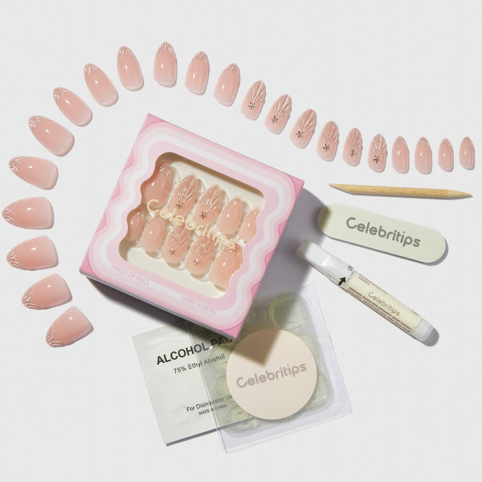Celebritips Princess By The Sea press-on nails set with nude pink design and gold accents, displayed with application tools