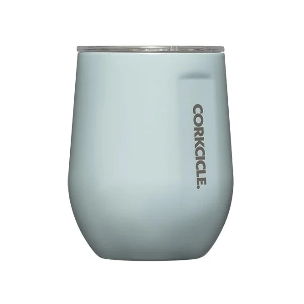 A light blue-gray insulated stemless wine tumbler with a clear lid and the CORKCILE brand name printed vertically on the side, shown against a plain white background.