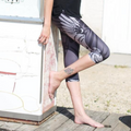 Silver eagle design on black. Largest selection of NoMiNoU Athleisure in Vancouver.