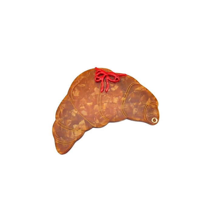 Solar Eclipse hand-painted bow croissant compact mirror with amber tortoiseshell finish and red bow