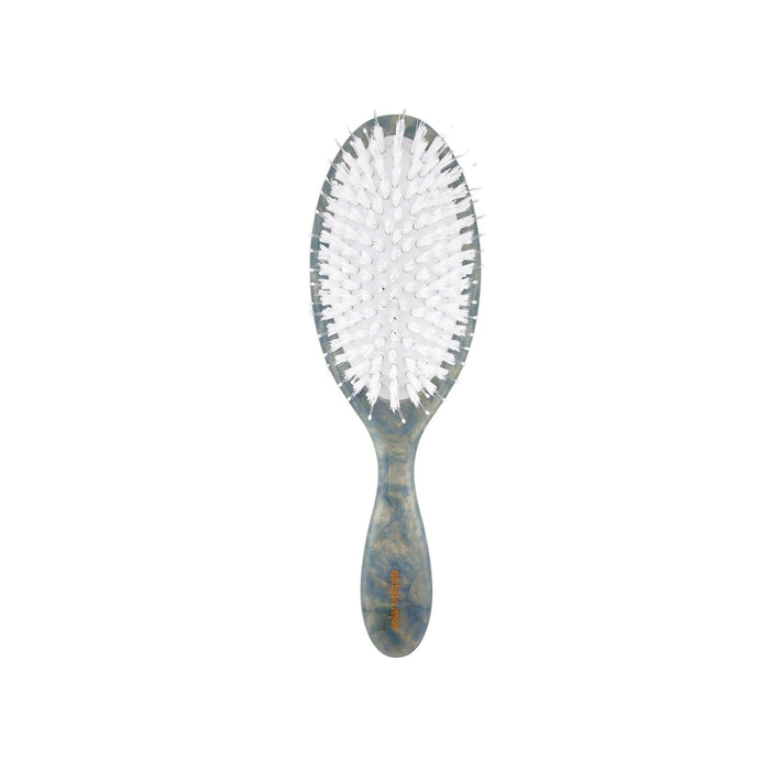 Solar Eclipse hand-painted horse hair brush with white bristles and patterned handle